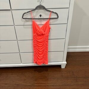 Lucy in the Sky size XS. Color Coral.